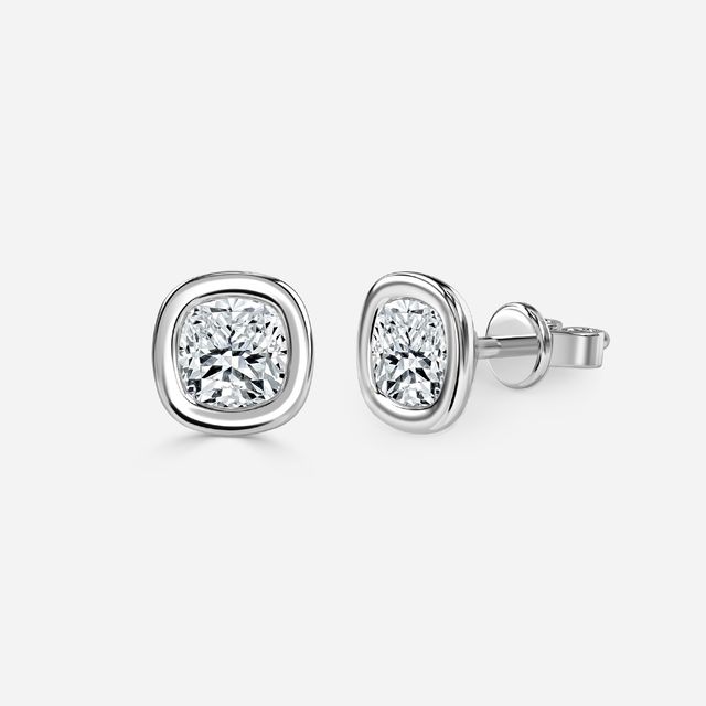 Bezel Set Cushion Cut Diamond Studs In Platinum