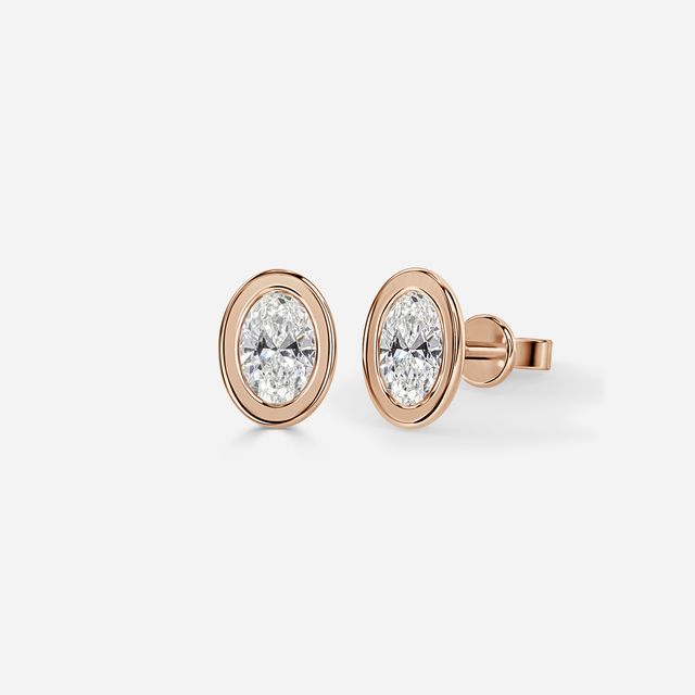 Bezel Set Rose Gold Oval Cut Diamond Studs