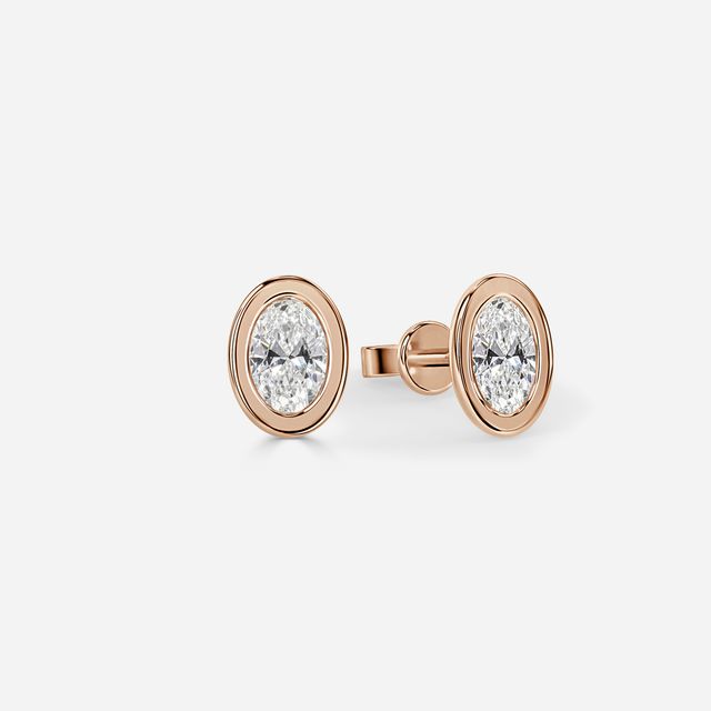 Bezel Set Rose Gold Oval Cut Diamond Studs