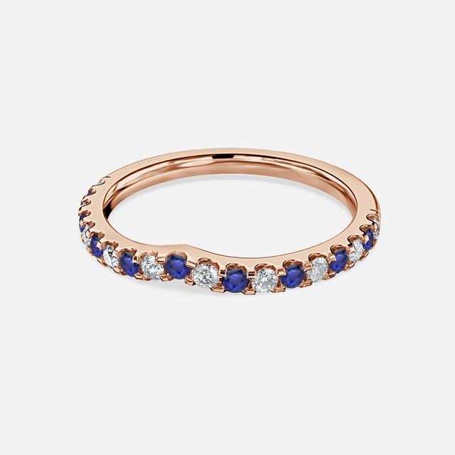 Curved Rose Gold Claw Set With Diamond And Blue Sapphire