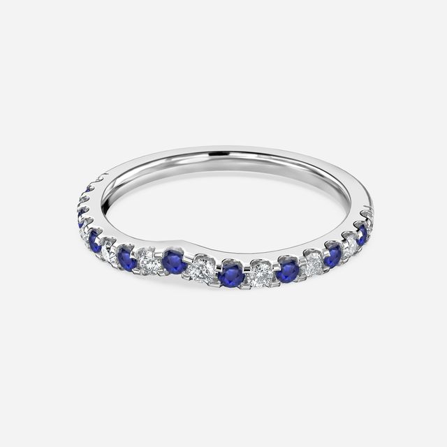 Curved White Gold Claw Set With Diamond And Blue Sapphire