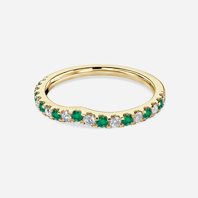 Curved Yellow Gold Claw Set With Diamond And Green Emerald