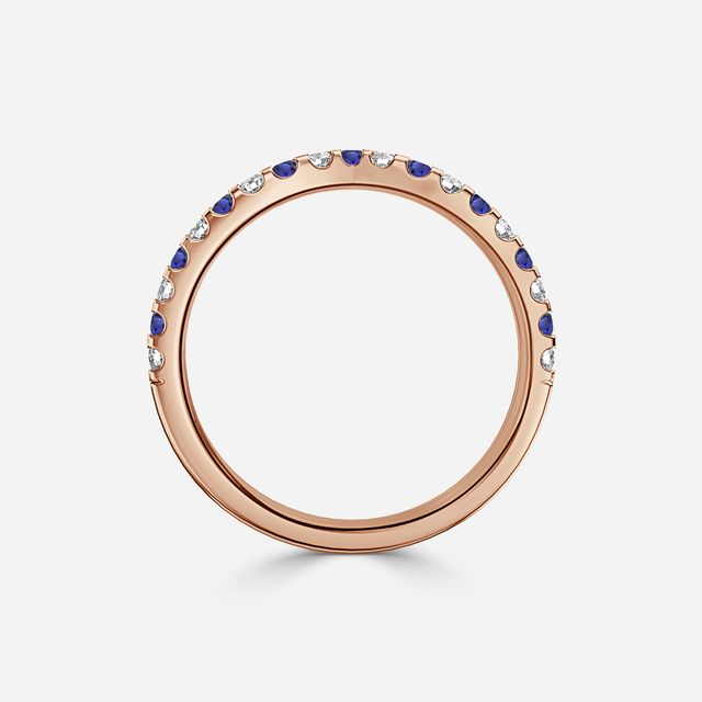 Curved Rose Gold Claw Set With Diamond And Blue Sapphire