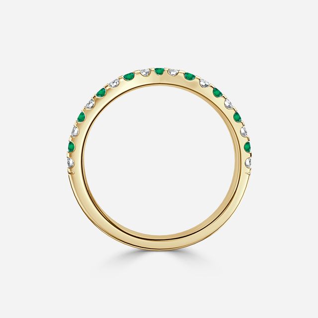 Curved Yellow Gold Claw Set With Diamond And Green Emerald