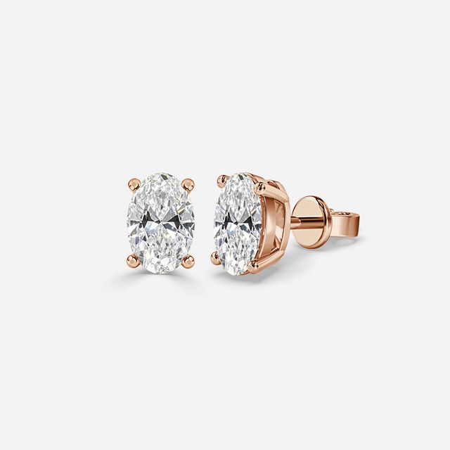 Oval Cut Diamond Stud Earrings In Rose Gold