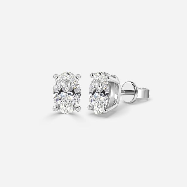 Oval Cut Diamond Stud Earrings In White Gold
