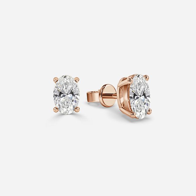 Oval Cut Diamond Stud Earrings In Rose Gold