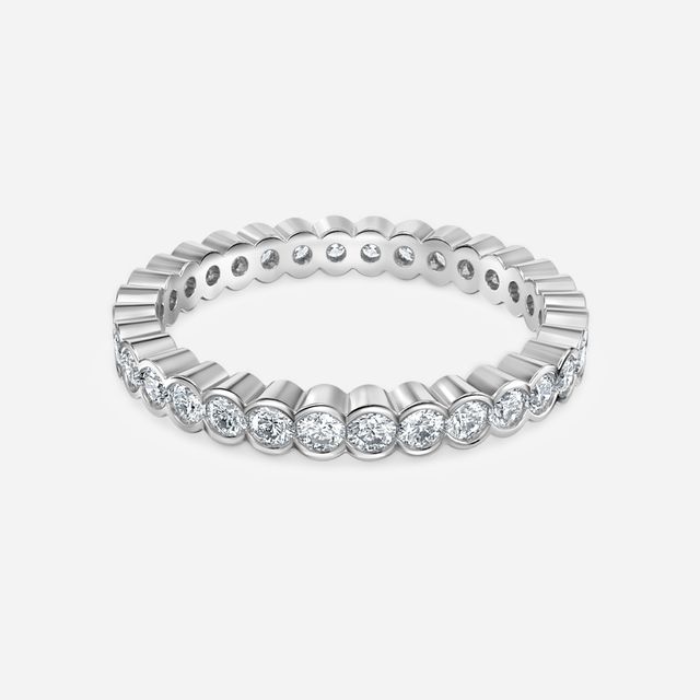 Round Brilliant Cut, Semi Rub Over Set Eternity Ring In Platinum