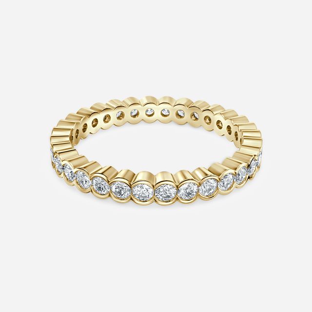 Round Brilliant Cut, Semi Rub Over Set Eternity Ring In Yellow Gold