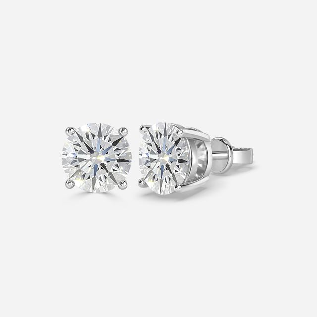 Round Cut Diamond Stud Earrings In White Gold