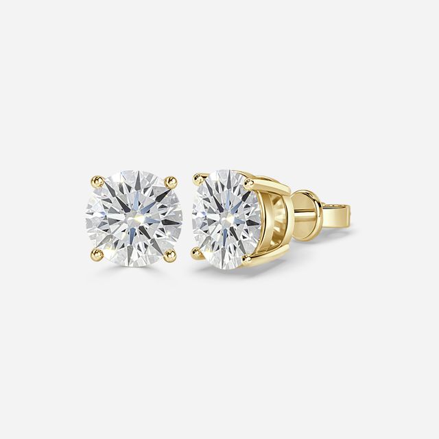 Round Cut Diamond Stud Earrings In Yellow Gold