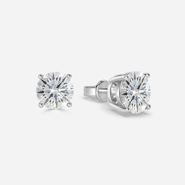 Round Cut Diamond Stud Earrings In White Gold