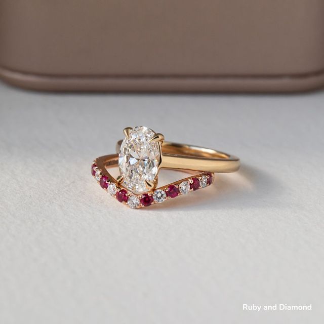 Curved Rose Gold Claw Set With Diamond And Ruby