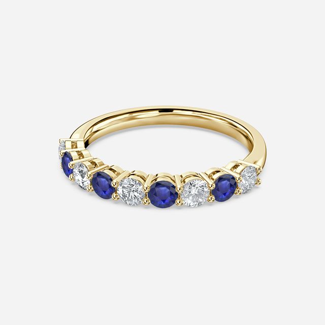 Blue Sapphire And Diamond Shared Single Claw Set In Yellow Gold