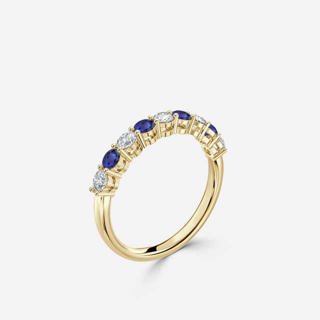 Blue Sapphire And Diamond Shared Single Claw Set In Yellow Gold