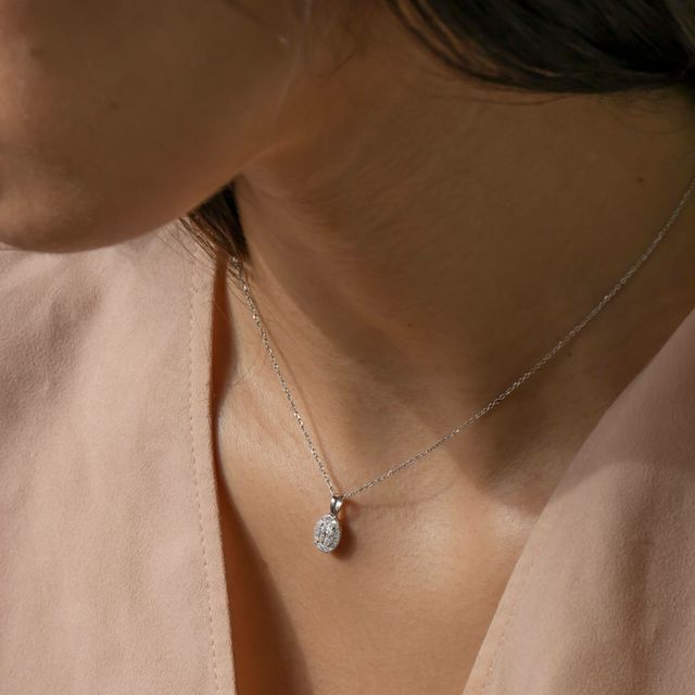 Oval Diamond Halo Pendant In White Gold