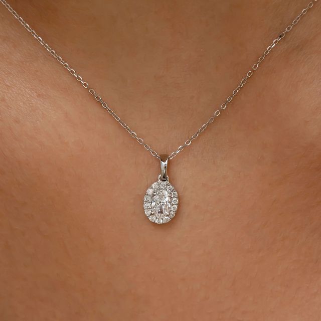 Oval Diamond Halo Pendant In White Gold