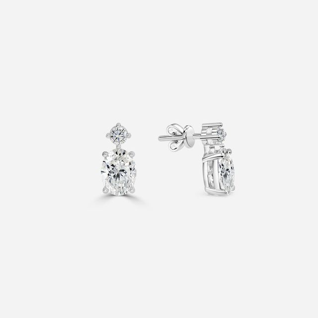 Drop Oval Diamond Earrings In White Gold