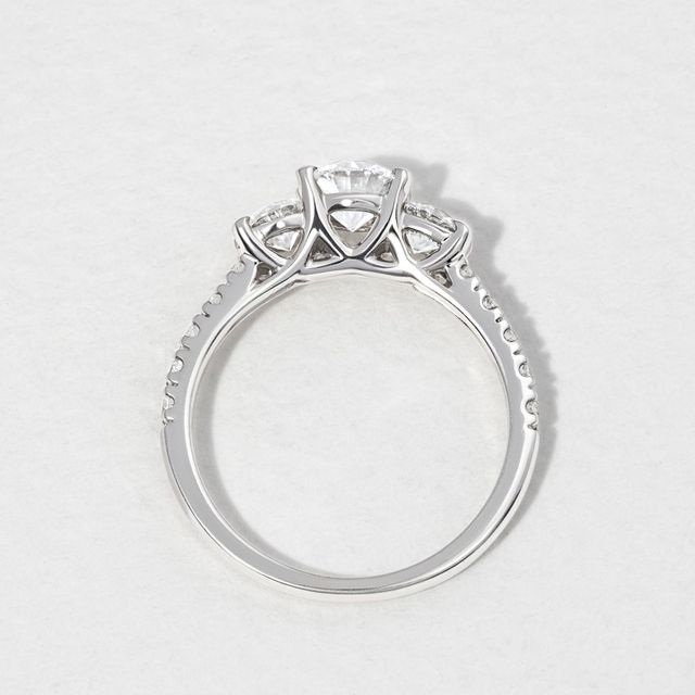 0.74 Carat Round Diamond Platinum Trilogy Engagement Ring