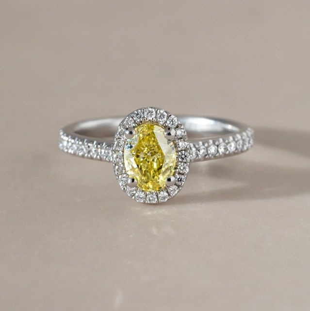Yellow Oval Diamond Halo Engagement Ring in Platinum - 0.66ct