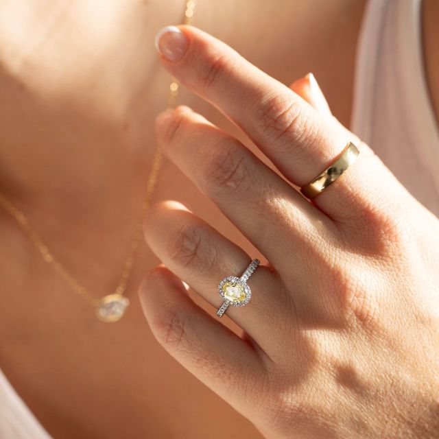 Yellow Oval Diamond Halo Engagement Ring in Platinum - 0.66ct