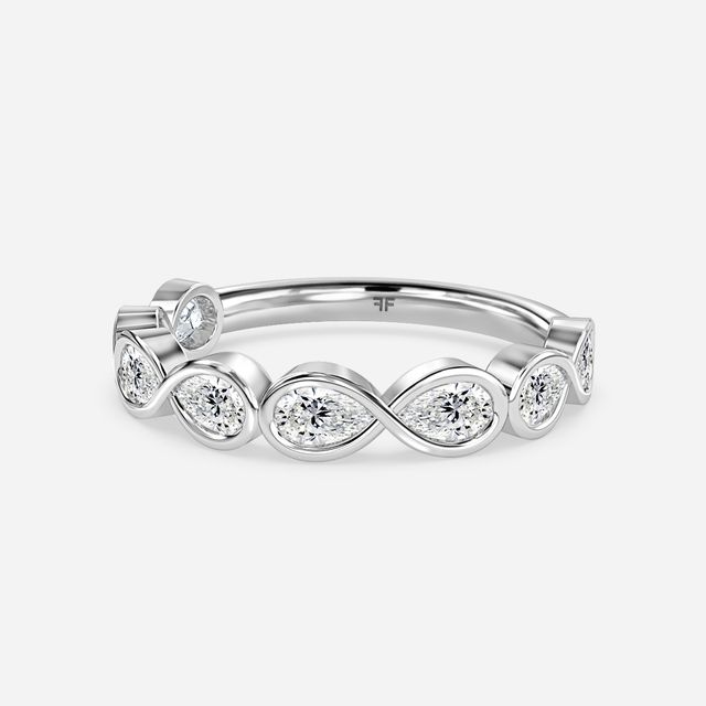 Pear Shaped Diamond Wedding Ring In Platinum