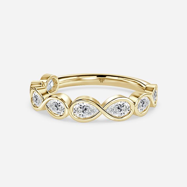 Pear Shaped Diamond Wedding Ring In Yellow Gold