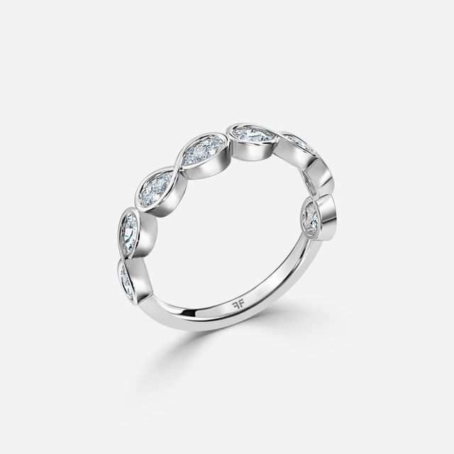 Pear Shaped Diamond Wedding Ring In Platinum