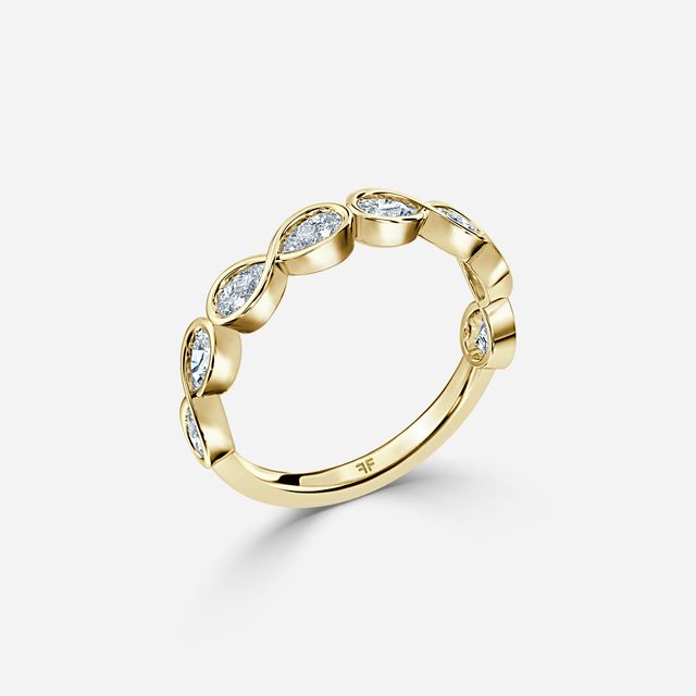 Pear Shaped Diamond Wedding Ring In Yellow Gold