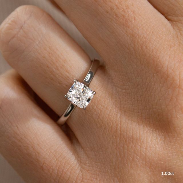 Firework Platinum Solitaire Engagement Ring