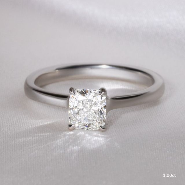 Firework Platinum Solitaire Engagement Ring