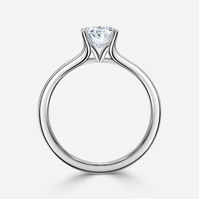 Firework Platinum Solitaire Engagement Ring