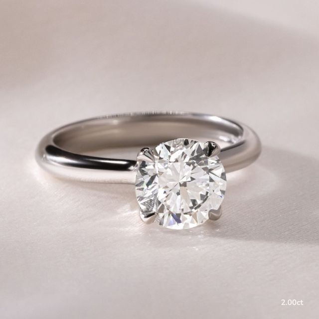 Firework Platinum Solitaire Engagement Ring