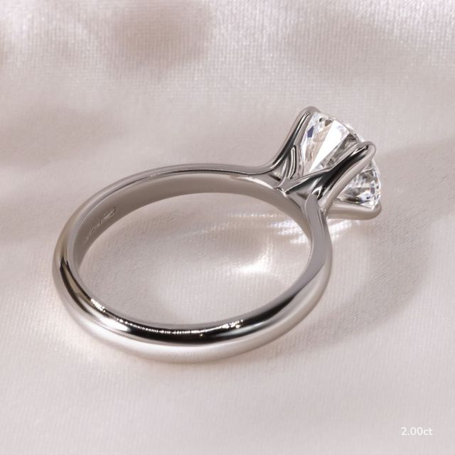 Firework Platinum Solitaire Engagement Ring