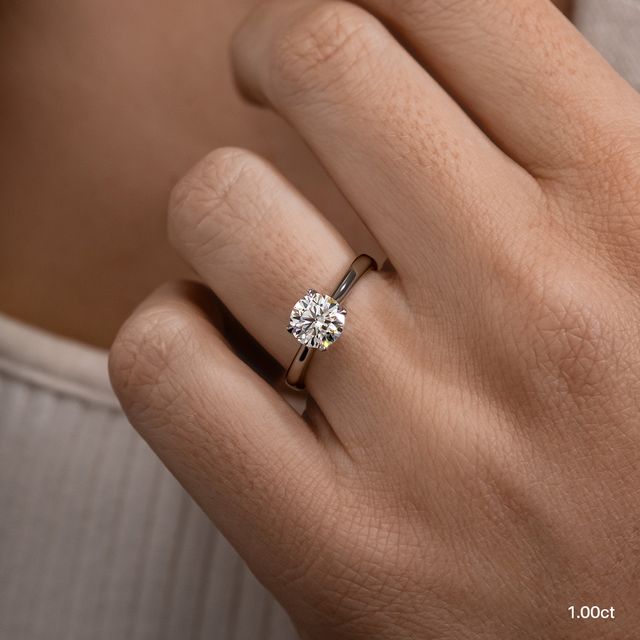 Firework Platinum Solitaire Engagement Ring