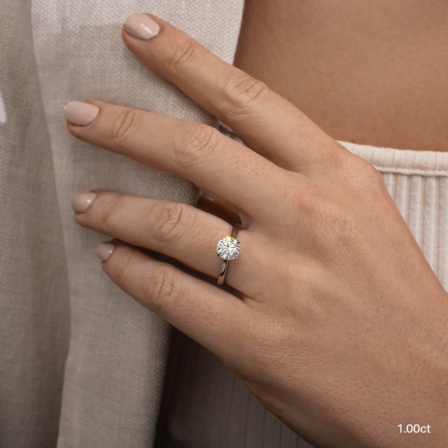 Firework Platinum Solitaire Engagement Ring