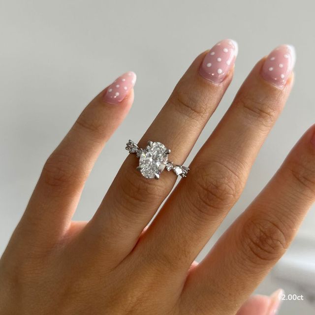 Laura Platinum Marquise And Round Diamond Band Engagement Ring