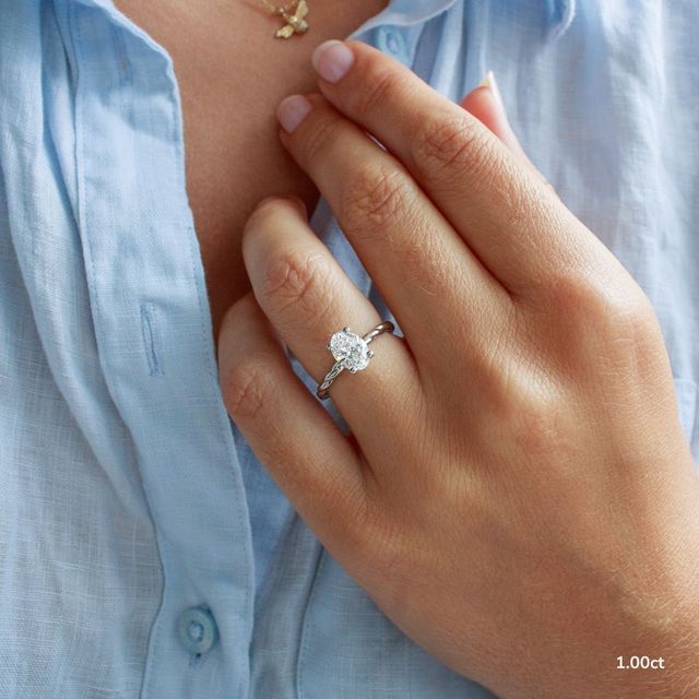Midas Twisted Band Solitaire Platinum Engagement Ring