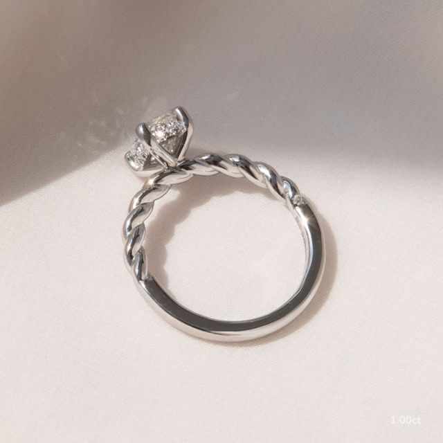 Midas Twisted Band Solitaire Platinum Engagement Ring