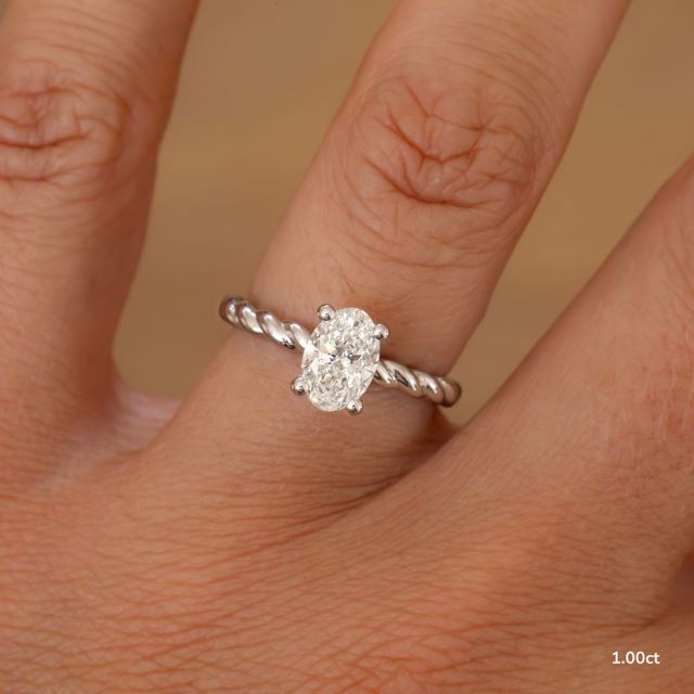 Midas Twisted Band Solitaire Platinum Engagement Ring