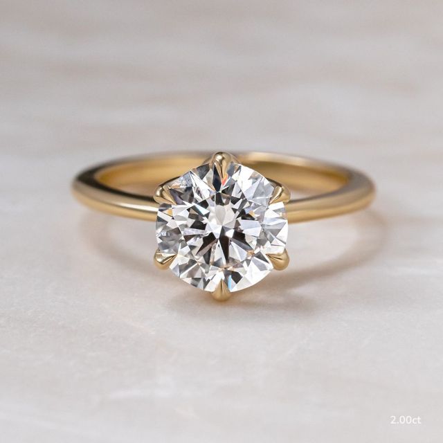 Elswin Yellow Gold Flower Engagement Ring