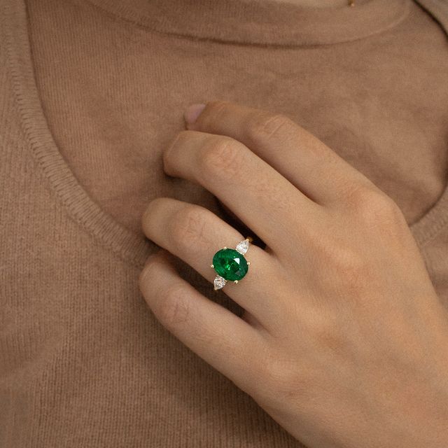 3 ct Oval Zambian Emerald Yellow Gold Trilogy Engagement Ring