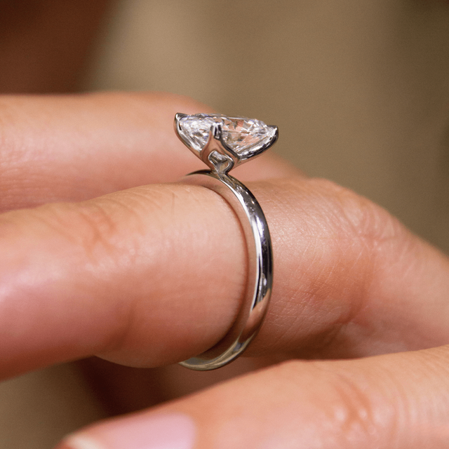 2 Carat Lab Grown Oval Cut Diamond Platinum Flower Solitaire Engagement Ring