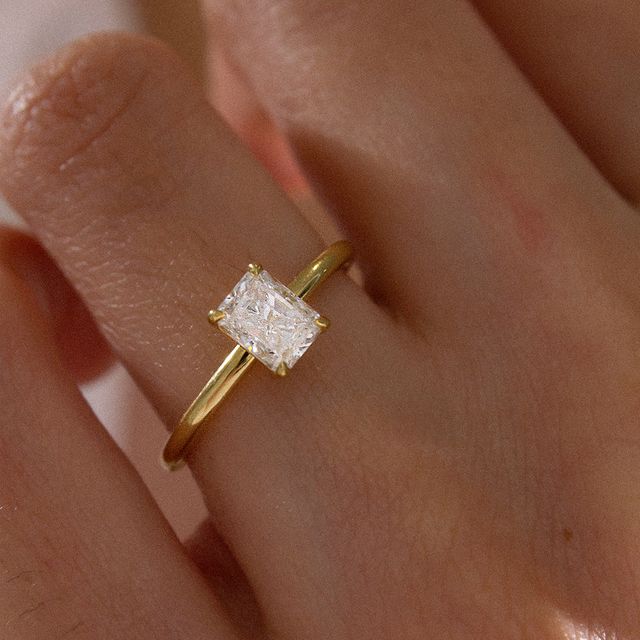 radiant solitaire ring gold