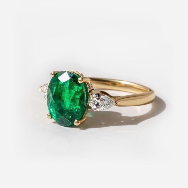 3 ct Oval Zambian Emerald Yellow Gold Trilogy Engagement Ring