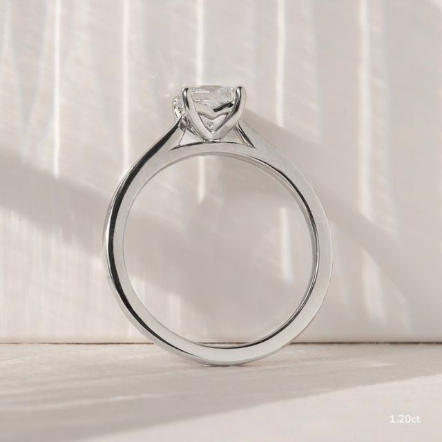 Naomi White Gold Tapered Solitaire Engagement Ring