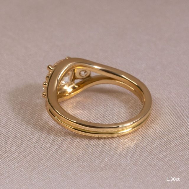 Serra Yellow Gold Semi Bezel Trilogy Engagement Ring