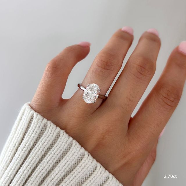 Fiara Platinum Under Twisted Double Prong Solitaire Engagement Ring