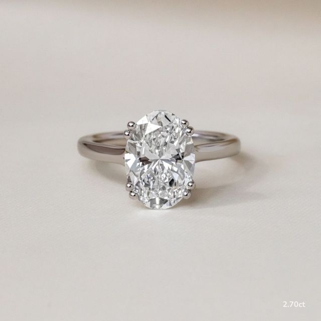 Fiara Platinum Under Twisted Double Prong Solitaire Engagement Ring