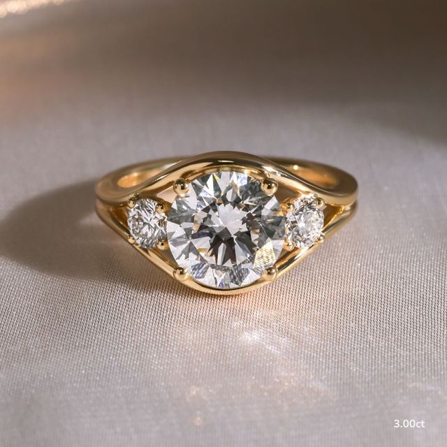 Serra Yellow Gold Semi Bezel Trilogy Engagement Ring